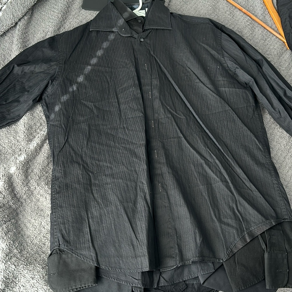 multiple black dress down shirts